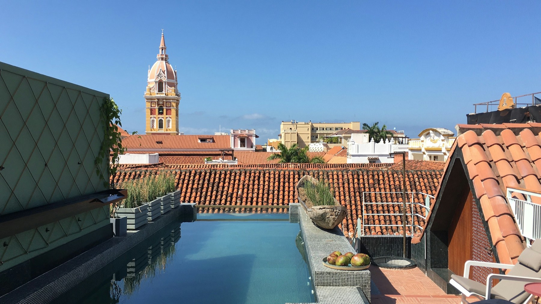 Rooftop pool with a view of Cartagena Cathedral